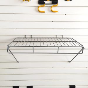 Slat wall storage shelf for warehouse storage room