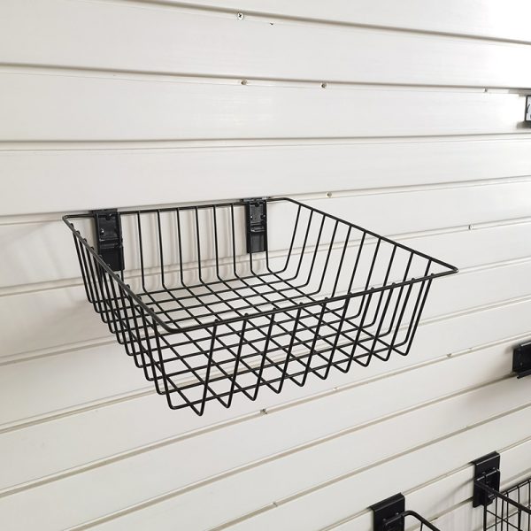 Basket for storage of ironwork items on a slatted wall, no nails required