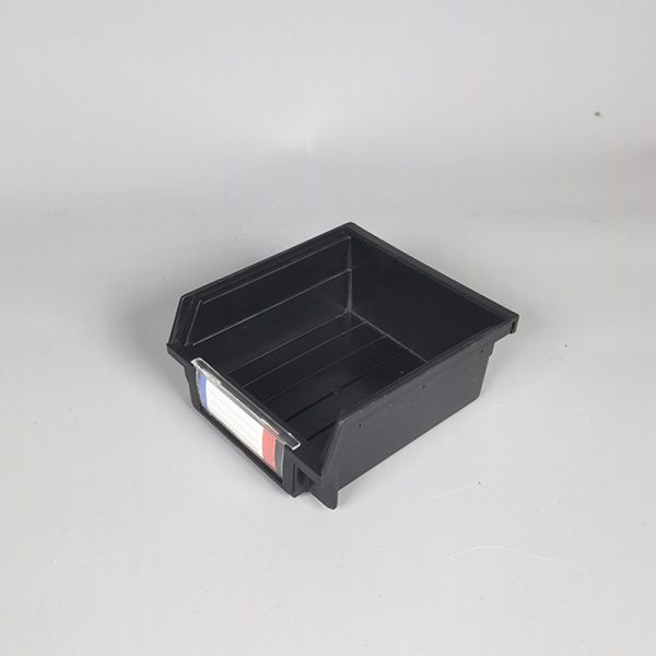 Plastic storage box with slanting parts hanging on the back of the hole board