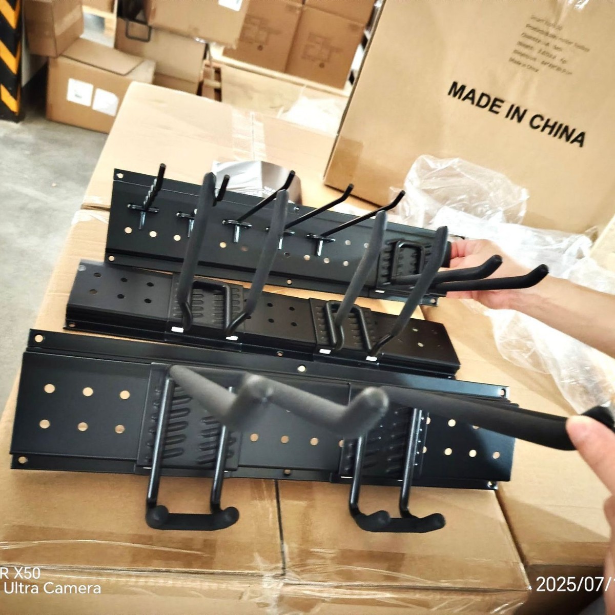 Heavy-duty adjustable hook for wall-mounted garage storage rack