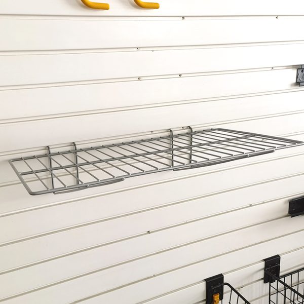 Wall-mounted storage rack with no holes in the metal slatted wall