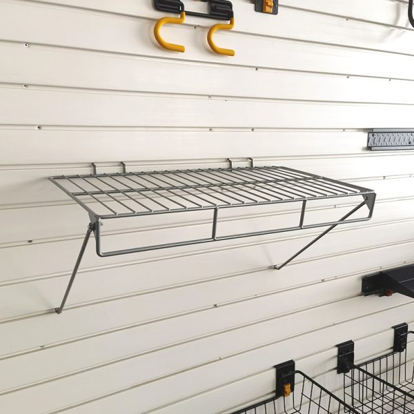 Slat wall storage shelf for warehouse storage room