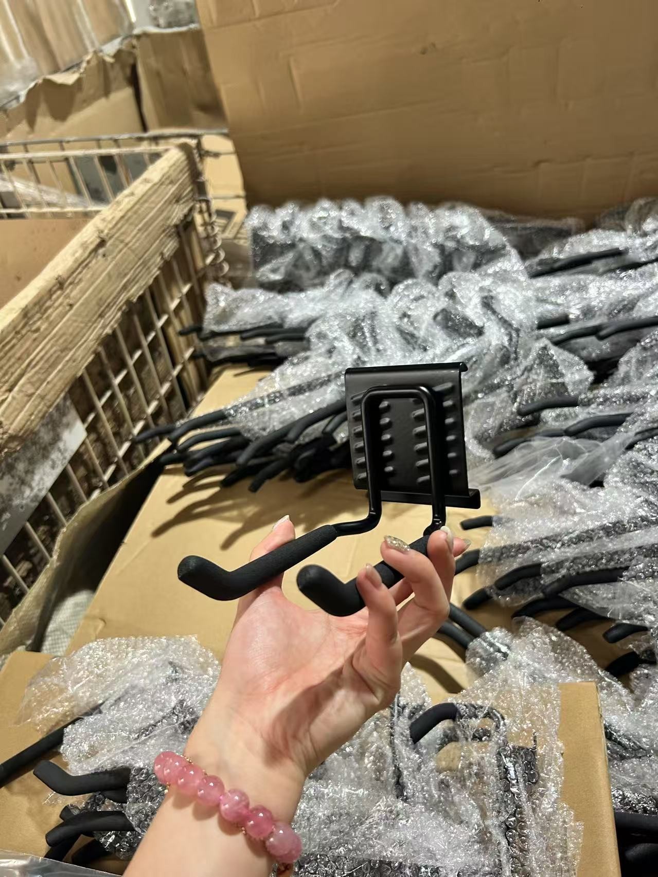 Heavy-duty adjustable hook for wall-mounted garage storage rack
