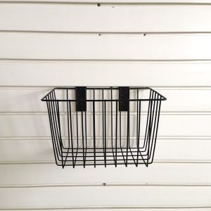 Basket for storage of ironwork items on a slatted wall, no nails required