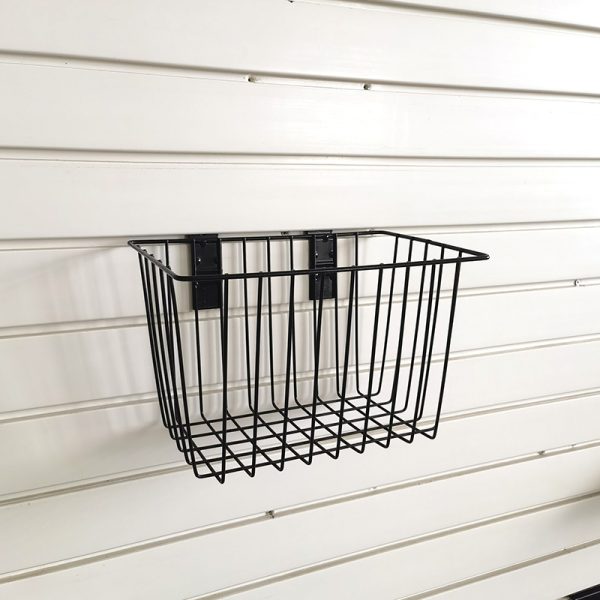 Basket for storage of ironwork items on a slatted wall, no nails required