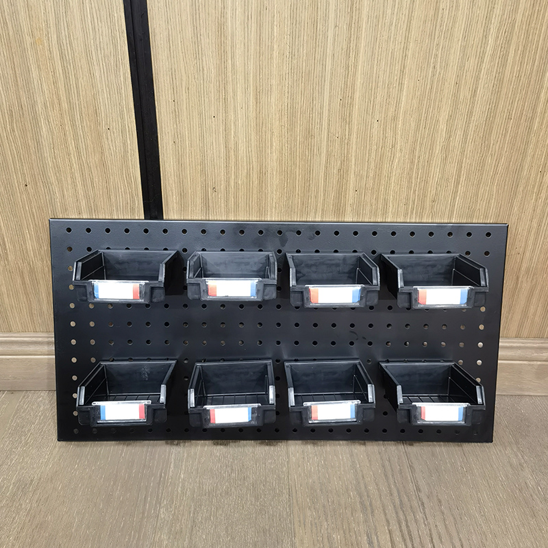 Plastic storage box with slanting parts hanging on the back of the hole board