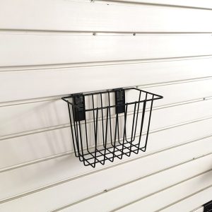 Basket for storage of ironwork items on a slatted wall, no nails required