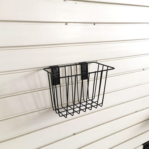 Basket for storage of ironwork items on a slatted wall, no nails required
