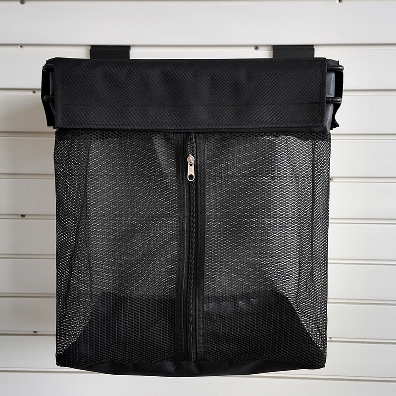 Storage basket with fabric buckle for slatwall