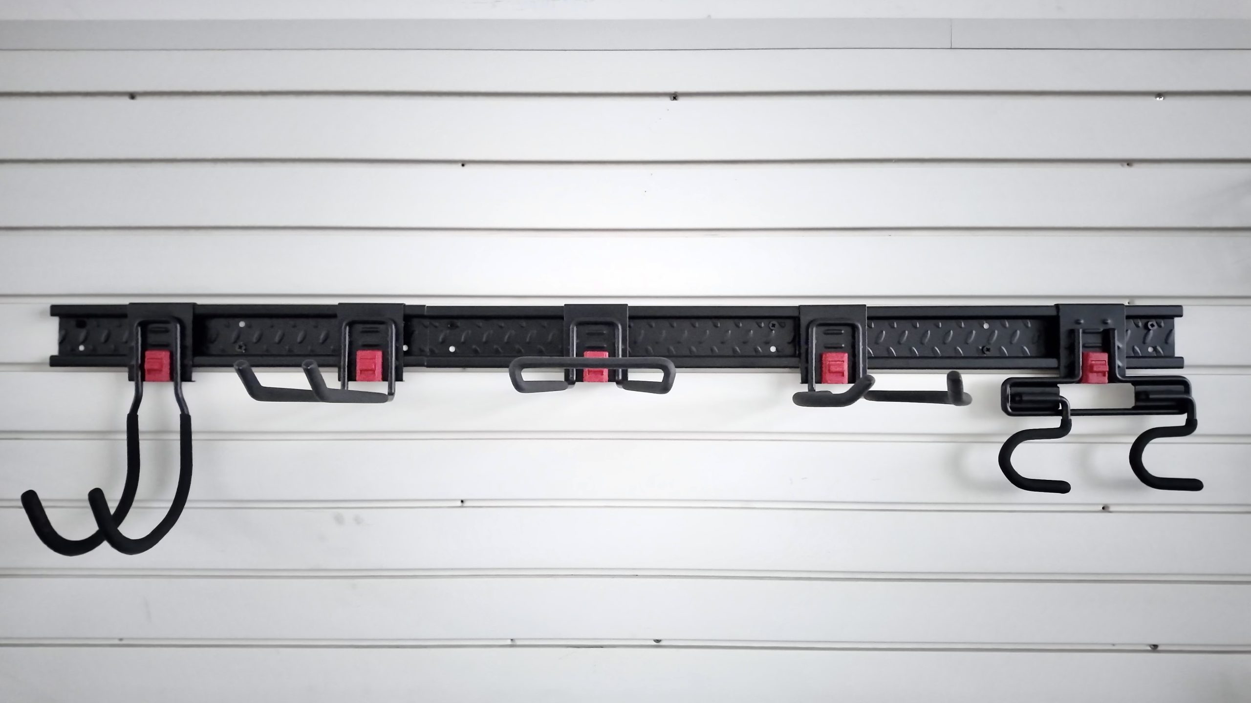 Multi functional hook combination for storing gardening tools on garden ...