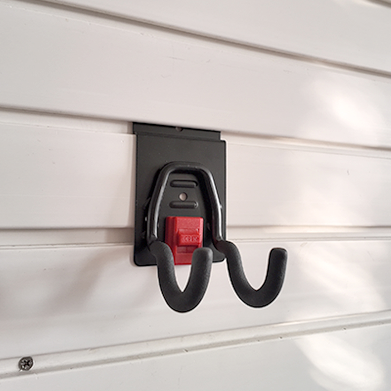 The small round hook on Slatwall is used for small electric tools in garages