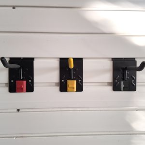 Slatwall four inch single hook, for storing garden lawn mowers and brush cutters